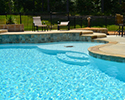 Custom Swimming Pool With Waterfall & Tanning Ledge