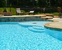 Custom Swimming Pool With Waterfall & Tanning Ledge