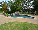 Freeform Custom Swimming Pool With Slide by Conway Pool Builders