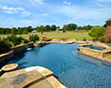Custom Swimming Pool With Waterfall & Tanning Ledge | Vilonia