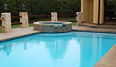 Rectangular custom pool with raised spa in Little Rock AR